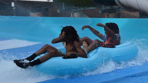 Youngsters from the Boys & Girls Club of Lanier enjoyed trying out the new Apocalypso slide at Fins Up Water Park, formerly Margaritaville at Lanier Islands Water Park.
(Courtesy of Fins Up at Margaritaville at Lanier Islands)