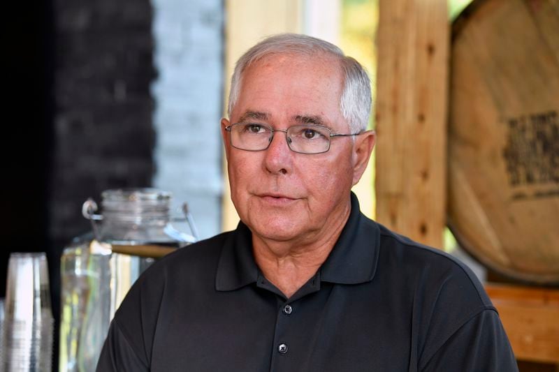 Eddie Russell, master distiller, and son of 89-year-old Jimmy Russell, the "Buddha of Bourbon" talks about having three generations of the Russell family involved in the bourbon industry at the Wild Turkey Distillery in Lawrenceburg, Ky., Wednesday, Aug. 28, 2024. (AP Photo/Timothy D. Easley)