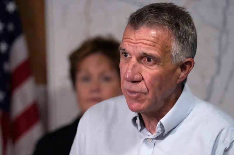Gov. Phil Scott updates reporters after remnants of Hurricane Beryl caused flooding and destruction across Vermont during a news conference, Friday, July 12, 2024, in Berlin, Vt. (AP Photo/Charles Krupa)