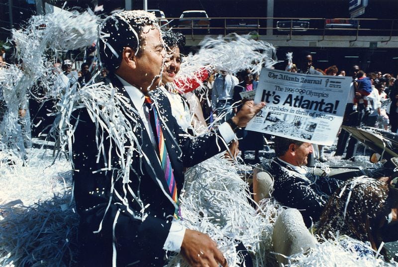 That announcement would be topped in 1990 when the International Olympic Committee selected Atlanta as the host city for the 1996 Summer Olympics. As co-chair of the Atlanta Olympics committee, Mayor Young led the team that pitched the city to the IOC. He and his wife Jean were bombarded with confetti during this parade soon after the selection. (Eric Williams / AJC file)