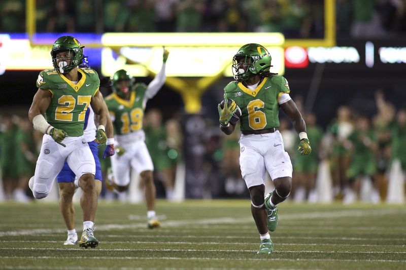 Oregon running back Noah Whittington (6) runs the ball for a touchdown during the second half of an NCAA college football game against Boise State, Saturday, Sept. 7, 2024, at Autzen Stadium in Eugene, Ore. (AP Photo/Lydia Ely)