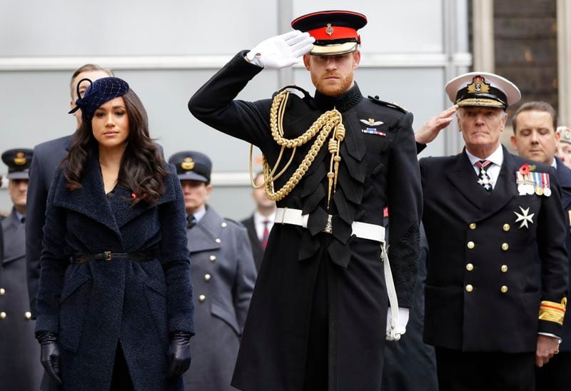 FILE - Britain's Prince Harry and Meghan, the Duchess of Sussex attend the 91st Field of Remembrance at Westminster Abbey in London, Thursday, Nov. 7, 2019. (AP Photo/Kirsty Wigglesworth, File)