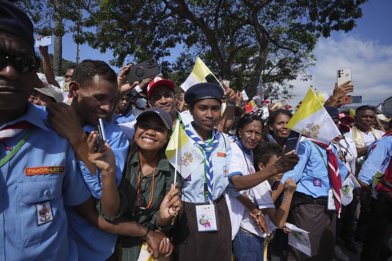 East Timorese gather to see Pope Francis in Dili, East Timor, Monday, Sept. 9, 2024. (AP Photo/Firdia Lisnawati)