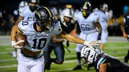 Sprayberry’s running back, Rayshawn Simpkins, makes his way down the field during the Sprayberry at Kennesaw Mountain high school football game in Kennesaw, GA on August 30, 2024. (Jamie Spaar for the Atlanta Journal Constitution)