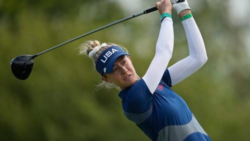 FILE - Nelly Korda, of the United States, hits her shot from the 14th tee during the third round of the women's golf event at the 2024 Summer Olympics, Friday, Aug. 9, 2024, at Le Golf National, in Saint-Quentin-en-Yvelines, France. Nelly Korda was playing such good golf in the first half of 2024 that her rivals were starting to hope she wouldn’t turn up for tournaments. (AP Photo/Matt York)