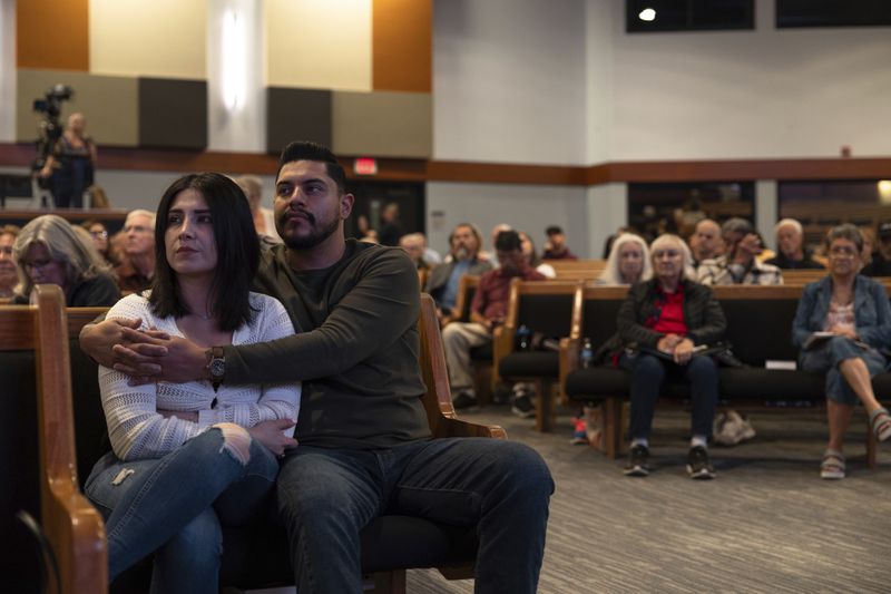 Audience members listen to Karen England speak at a Comeback California Tour event at Revival Fellowship, Saturday, Sept. 21, 2024, in Menifee, Calif. (AP Photo/Zoë Meyers)