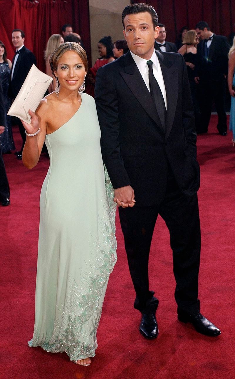 FILE - Actors Jennifer Lopez and Ben Affleck arrive for the 75th annual Academy Awards in Los Angeles on March 23, 2003. (AP Photo/Kim D. Johnson, File)