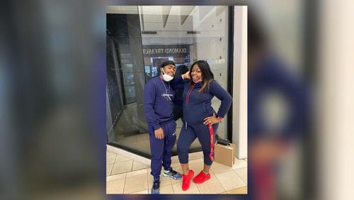 Corey Jackson (left) and his mother Queshon Walker smile for a photo.