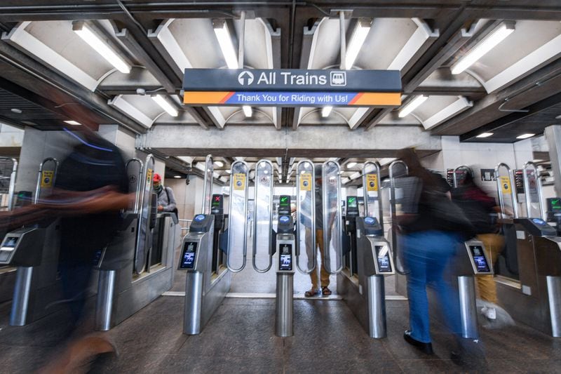 Passengers walk in and out of the Five Point Station in Atlanta, Georgia on  Tuesday, June 25, 2024.  (Ziyu Julian Zhu / AJC)