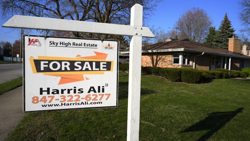 A "For Sale" sign is displayed in front of a home in Skokie, Ill., Sunday, April 14, 2024. On Thursday, Mat 23, 2024, Freddie Mac reports on this week's average U.S. mortgage rates. (AP Photo/Nam Y. Huh)