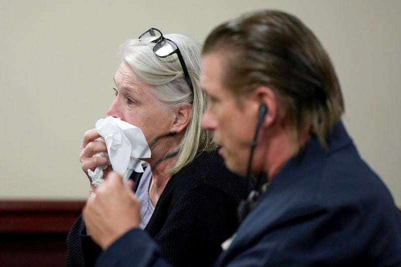 Elizabeth Keuchler, left, and her brother Stephen Baldwin react during actor Alec Baldwin's trial for involuntary manslaughter for the 2021 fatal shooting of cinematographer Halyna Hutchins during filming of the Western movie "Rust," Friday, July 12, 2024, in Santa Fe, N.M. The judge threw out the case against Alec Baldwin in the middle of his trial and said it cannot be filed again. (Ramsay de Give/Pool Photo via AP)