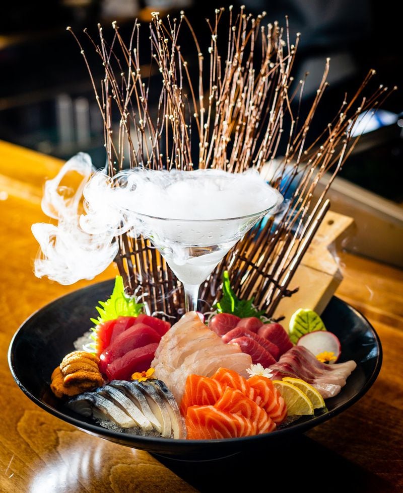 The seasonal sashimi platter at Chirori shows up with clouds of smoke (thanks to some dry ice splashed with water). CONTRIBUTED BY HENRI HOLLIS