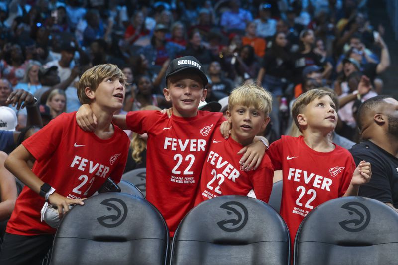 Young fans of Indiana Fever guard Caitlin Clark cheer on the Indiana Fever during the Fever game against the Atlanta Dream at State Farm Arena, Friday, June 21, 2024, in Atlanta. Indiana won 91-79. (Jason Getz / AJC)
