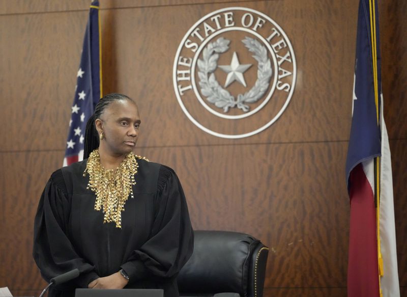 Judge Veronica M. Nelson watches as the jury enters the courtroom for the verdict in the murder trial of former Houston police officer Gerald Goines in the 482nd District Court at the Harris County Criminal courthouse Wednesday, Sept. 25, 2024, in Houston. (Melissa Phillip/Houston Chronicle via AP, Pool)