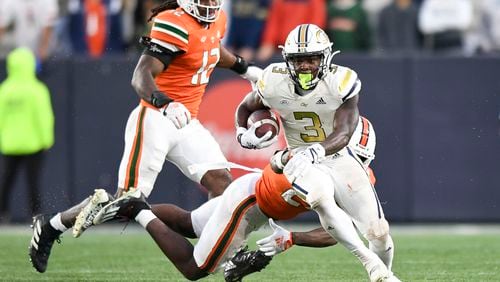 Georgia Tech Yellow Jackets running back Hassan Hall (3) carries the ball for a gain in yardage during the second half of play Saturday, Nov. 12, 2022 at Bobby Dodd Stadium. (Daniel Varnado/For the AJC)