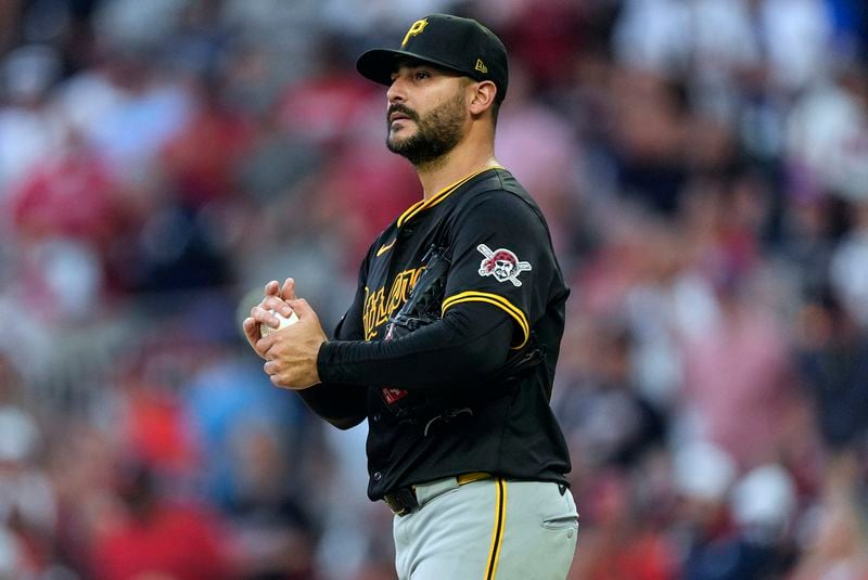Pittsburgh Pirates starting pitcher Martin Perez paces on the mound after giving up a three-run double to Atlanta Braves designated hitter Marcell Ozuna in the third inning of a baseball game Friday, June 28, 2024, in Atlanta. (AP Photo/John Bazemore)