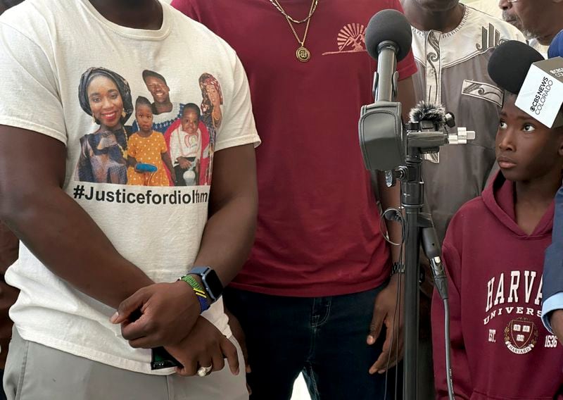 Supporters speak to the media in Denver on Tuesday, July 2, 2024, after a Colorado man was sentenced to 60 years in prison for starting a house fire that killed five members of an extended Senegalese family. AP Photo/Thomas Peipert)