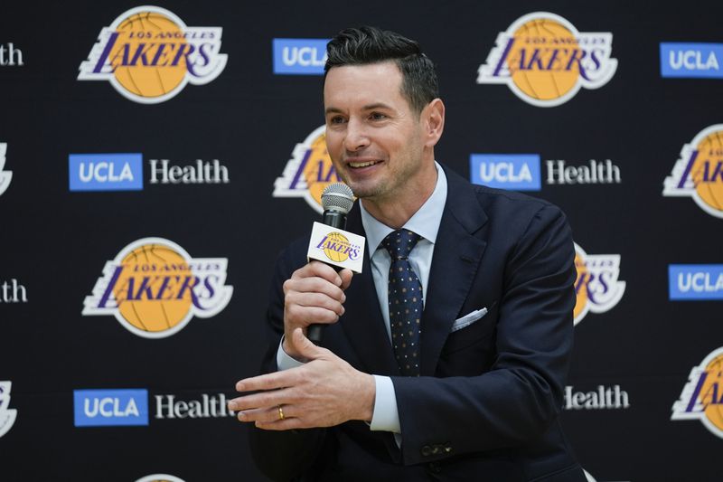 JJ Redick speaks after being introduced as the new head coach of the Los Angeles Lakers NBA basketball team Monday, June 24, 2024, in El Segundo, Calif. (AP Photo/Damian Dovarganes)