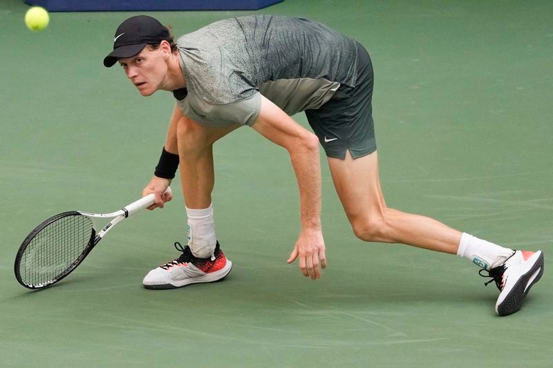 Jannik Sinner, of Italy, returns a shot to Mackenzie McDonald, of the United States, during the first round of the U.S. Open tennis championships, Tuesday, Aug. 27, 2024, in New York. (AP Photo/Julia Nikhinson)