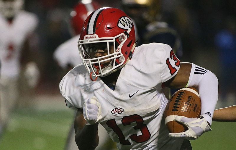 Woodward Academy's Elijah Holyfield is among the top-rated running backs in the state. (Phil Skinner/Special to AJC)
