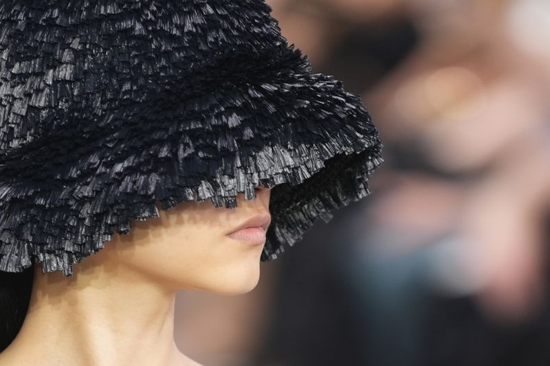 A model walks the runway during the Michael Kors Collection spring/summer 2025 fashion show as part of New York Fashion Week, Tuesday, Sept. 10, 2024, in New York. (AP Photo/Pamela Smith)