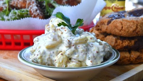 Fingerling Potato Salad, from The Best Sandwich Shop, shown here accompanied by the restaurant's breaded chicken cutlet and arugula sandwich and brown butter chocolate chip cookies. (Chris Hunt for The Atlanta Journal-Constitution)