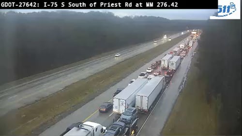 Traffic on I-75 South was backed up after a tractor-trailer crashed near Acworth on Wednesday morning.