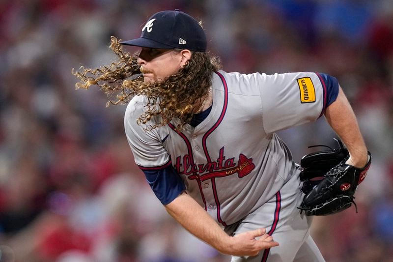 Atlanta Braves' Grant Holmes pitches during the seventh inning of a baseball game against the Philadelphia Phillies, Thursday, Aug. 29, 2024, in Philadelphia. (AP Photo/Matt Slocum)