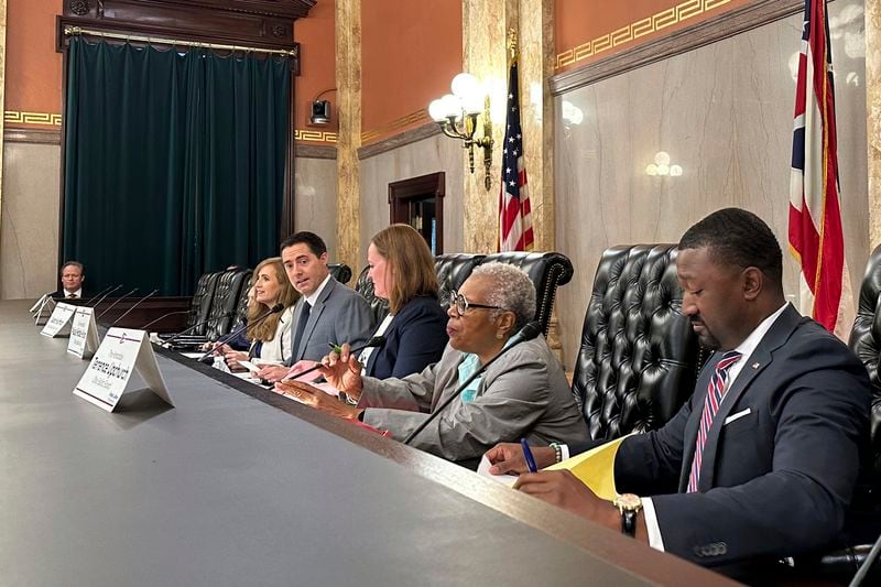 Members of the Ohio Ballot Board convene at the Ohio Statehouse in Columbus, Ohio, Friday, Aug. 16, 2024, to consider language for a fall redistricting amendment. (AP Photo/Julie Carr Smyth)