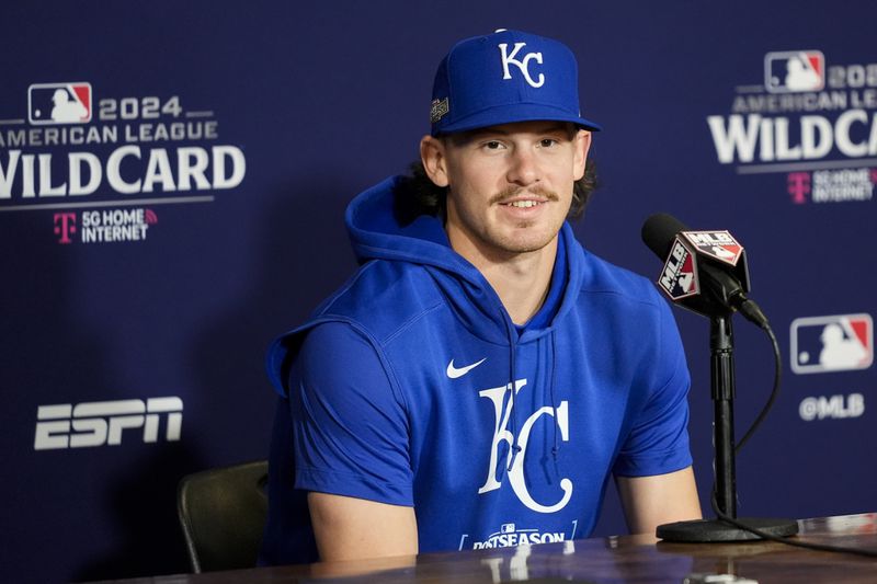 Kansas City Royals shortstop Bobby Witt Jr. speaks to press before a baseball workout a day before the team's wild card playoff game against the Baltimore Orioles, Monday, Sept. 30, 2024, in Baltimore. (AP Photo/Stephanie Scarbrough)