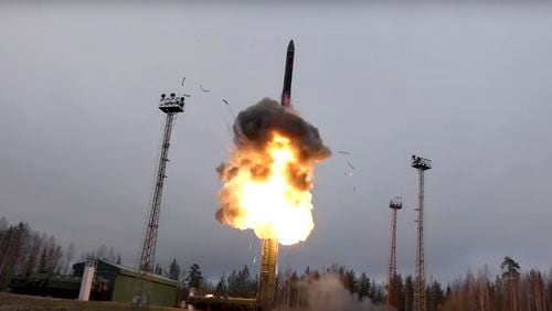 In this photo distributed by the Russian Defense Ministry Press Service, an intercontinental ballistic missile lifts off from a truck-mounted launcher in Russia. The Russian military said the Avangard hypersonic weapon entered combat duty Friday. The Kremlin has made modernization of Russia's strategic nuclear forces one of its top priorities.