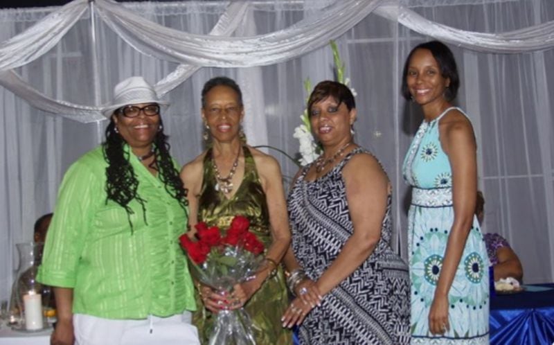 Supply chain and labor issues along with a pandemic have caused delays in grieving families getting gravestones. Conyers resident Roshelle Darlene Hudson (far left) is shown here with her late mother, Barbara Ann Galbert (holding flowers) and two sisters in July 2020;