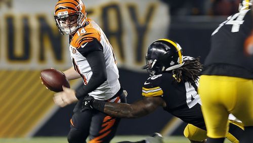 Cincinnati Bengals quarterback Andy Dalton (14) is sacked by Pittsburgh Steelers outside linebacker Bud Dupree (48) during the second half of an NFL football game in Pittsburgh, Sunday, Oct. 22, 2017. (AP Photo/Keith Srakocic)