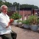 Gabe Bencivenga the former co-owner of Gene and Gabe s Italian Lodge on the rooftop of his restaurant where he hasd several fruit trees and vegetables growing from barrels and drums. Bencivenga's restaurants and cabaret were the place to be in Atlanta and Roswell. He died earlier this week. AJC File