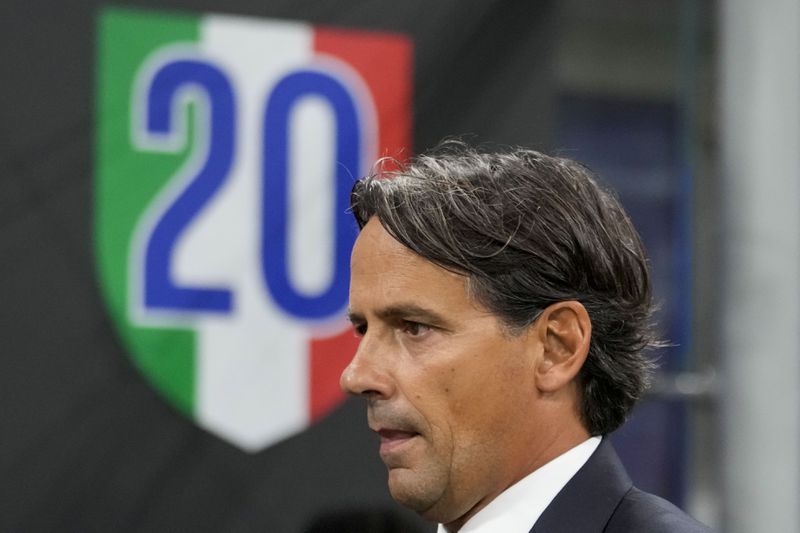 Inter Milan's head coach Simone Inzaghi looks on prior a Serie A soccer match between Inter Milan and Lecce, at the San Siro stadium in Milan, Italy, Saturday, Aug. 24, 2024. (AP Photo/Luca Bruno)