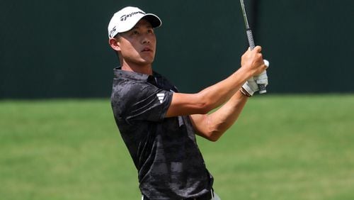 Collin Morikawa hits his second shot on the first fairway during the first round of the Tour Championship at East Lake Golf Club, on Thursday, Aug. 29, 2024, in Atlanta. (Jason Getz / AJC)
