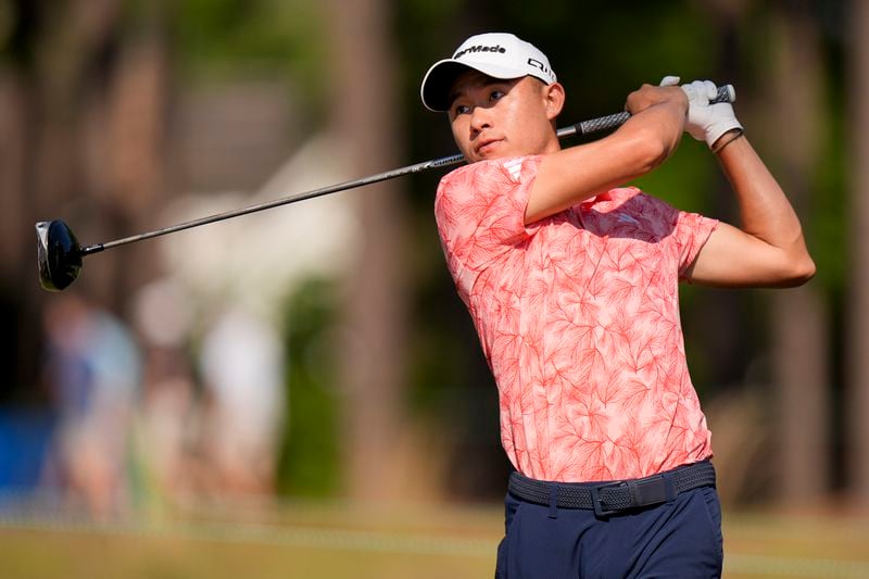 Collin Morikawa watches his tee shot on the eighth hole during the first round of the U.S. Open golf tournament Thursday, June 13, 2024, in Pinehurst, N.C. (AP Photo/Frank Franklin II )