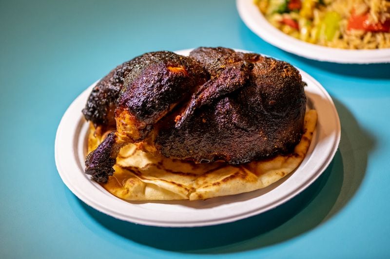 This is a half chicken from Nani's Piri Piri Chicken. Owner Meherwan Irani realized during the pandemic: “I think I can give them a far superior experience compared to the random grocery store rotisserie chicken." (Mia Yakel for The Atlanta Journal-Constitution)