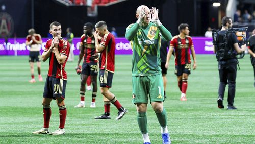 Atlanta United players wave to fans in the stands following an MLS soccer match against CF Montreal on Wednesday, Oct. 2, 2024. (Miguel Martinez/Atlanta Journal-Constitution via AP)