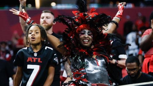 Falcons fans celebrtae their team after the Falcons defeated the New Orleans Saints 26-24  on Sunday, Sept. 29, at Mercedes-Benz Stadium in Atlanta. 
(Miguel Martinez/ AJC)