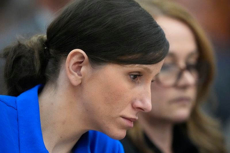 Kouri Richins, a Utah mother of three who wrote a children's book about coping with grief after her husband's death and was later accused of fatally poisoning him, looks on during a hearing Tuesday, Aug. 27, 2024, in Park City, Utah. (AP Photo/Rick Bowmer, Pool)