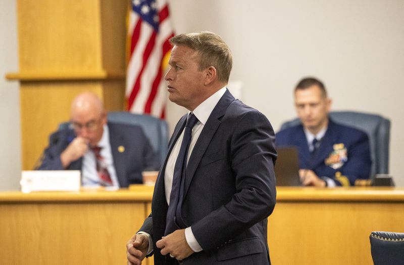 Former OceanGate's Director of Marine Operations, David Lochridge, center, stands during his testimony, Tuesday, Sept. 17, 2024, for the Titan marine board formal hearing inside the Charleston County Council Chambers, in North Charleston, S.C. (Andrew J. Whitaker/The Post And Courier via AP, Pool)