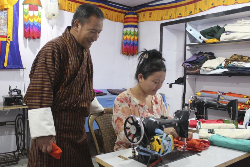 This undated photo provided by the Ramon Magsaysay Award Foundation shows 2024 Ramon Magsaysay Awardee, Karma Phuntsho, left, from Bhutan. (Ramon Magsaysay Awards Foundation via AP)