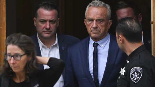 FILE - Independent presidential candidate Robert F. Kennedy Jr., center right, leaves the Albany County Courthouse, Aug. 6, 2024, in Albany, N.Y. (AP Photo/Hans Pennink, File)