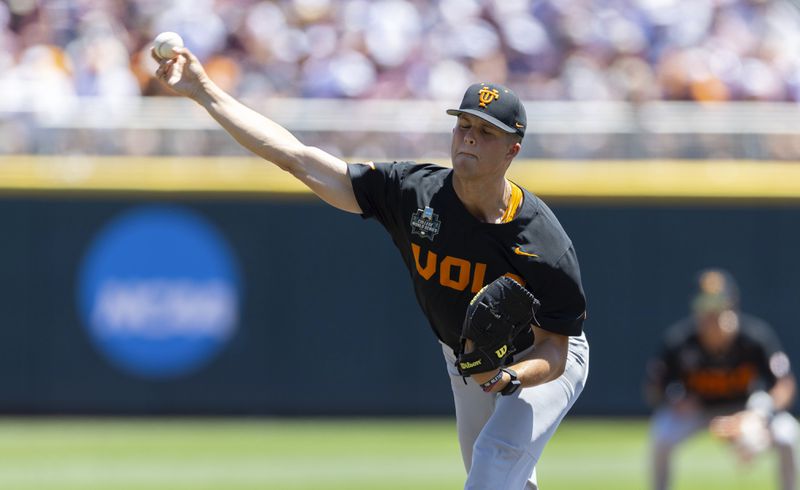 Tennessee starting pitcher Drew Beam throws against Texas A&M in the first inning of Game 2 of the NCAA College World Series baseball finals in Omaha, Neb., Sunday, June 23, 2024. (AP Photo/Rebecca S. Gratz)
