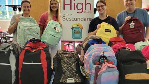 Volunteers with North Fulton Community Charities sort and distribute new backpacks and school supplies each year for the organization's Back-to-School campaign. (Courtesy North Fulton Community Charities)