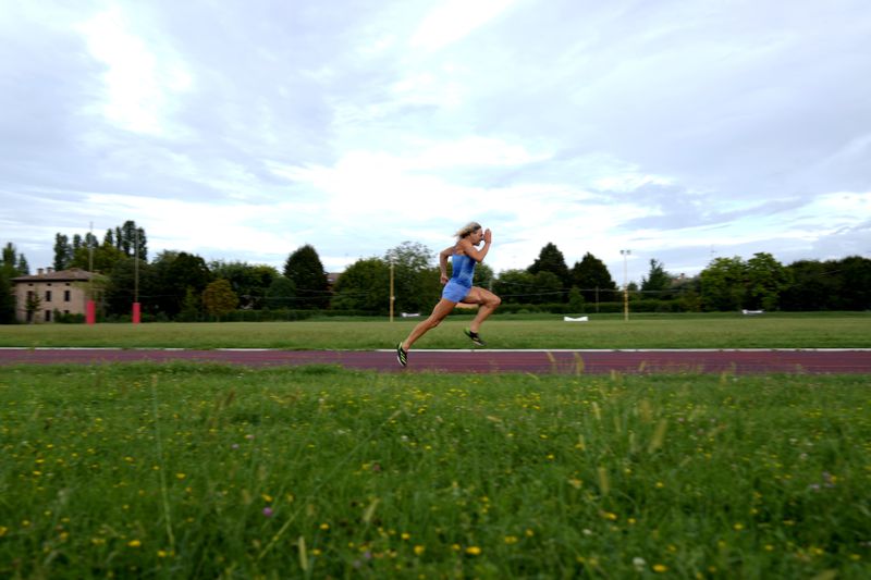 Italy's Valentina Petrillo trains in Pieve di Cento, near Bologna, Italy, Monday, Aug. 19, 2024. Valentina Petrillo is set to become the first transgender woman to compete at the Paralympic Games at the end of this month in Paris. (AP Photo/Antonio Calanni)