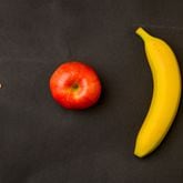 A lentil shows about how big a human embryo is when measured at six weeks of pregnancy.  At 15 weeks, the fetus is about the size of an apple, and at 20, about the size of a banana.  Pregnancy apps often use fruit to show the size of human development at different stages of pregnancy.    (PHOTO by Hyosub Shin / Hyosub.Shin@ajc.com)