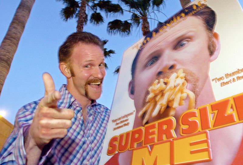 FILE - Morgan Spurlock poses at the Los Angeles premiere of his film "Super Size Me," Thursday night, April 22, 2004, in the Hollywood section of Los Angeles. Spurlock, an Oscar-nominee who made food and American diets his life’s work, famously eating only at McDonald’s for a month to illustrate the dangers of a fast-food diet, has died. He was 53. (AP Photo/Mark J. Terrill)