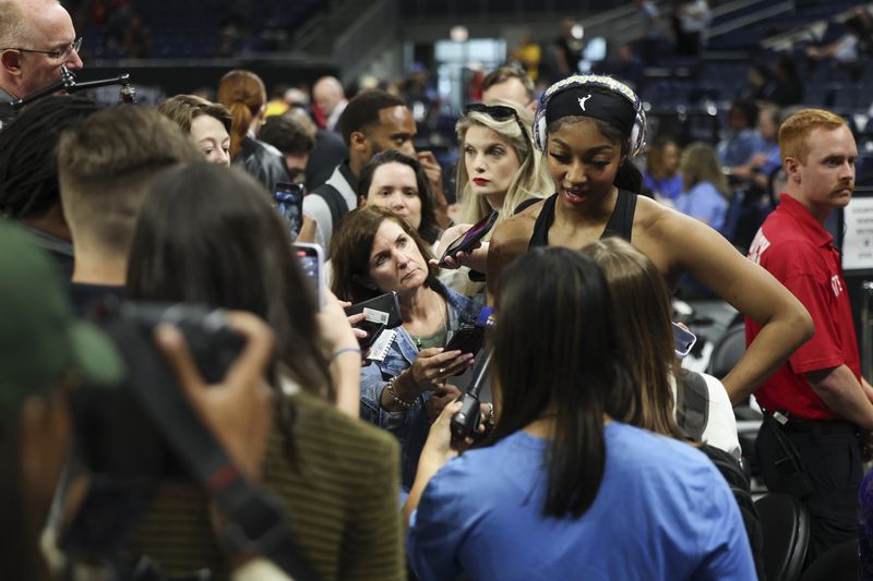 Chicago Sky forward Angel Reese answers questions before a WNBA basketball game against the Indiana Fever, Sunday, June 23, 2024, in Chicago. (Eileen T. Meslar/Chicago Tribune via AP)